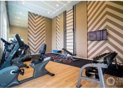 Modern fitness room with gym equipment