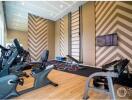 Modern fitness room with gym equipment