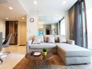 Modern living room with a sectional sofa and a coffee table