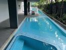 Outdoor swimming pool with seating area