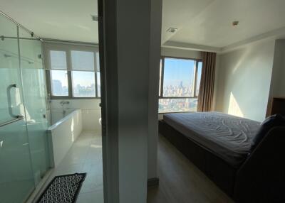 Bedroom with adjoining bathroom and panoramic views