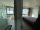 Bedroom with adjoining bathroom and panoramic views