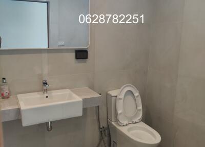 Modern bathroom with sink and toilet