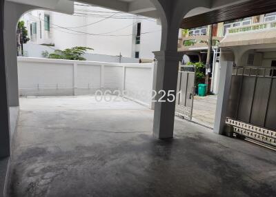 Outdoor garage space with gated entry