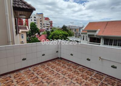 Balcony with tiled floor and city view