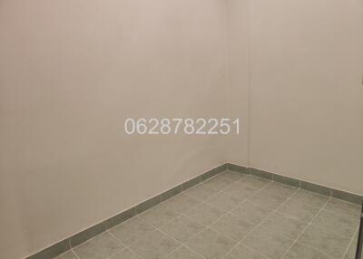 Empty room with tiled floor