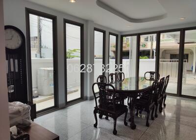 spacious dining area with large windows