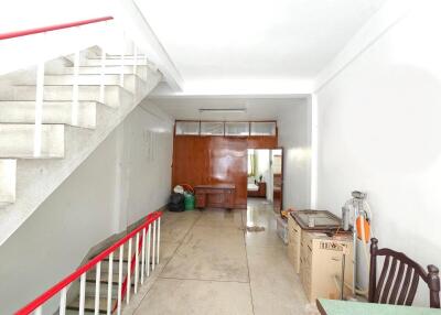 Spacious entryway with staircase