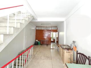 Spacious entryway with staircase