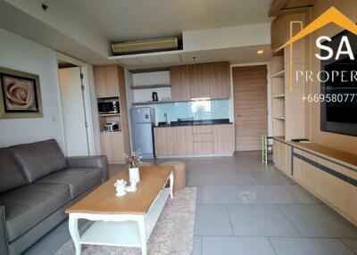 Main living area with kitchenette and sitting area