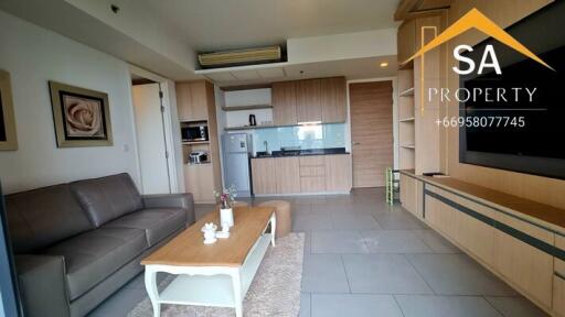 Main living area with kitchenette and sitting area