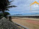 Seaside view with distant cityscape