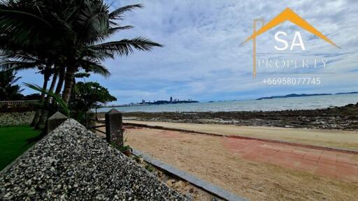 Seaside view with distant cityscape