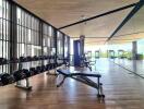 Modern gym with equipment and mirrors