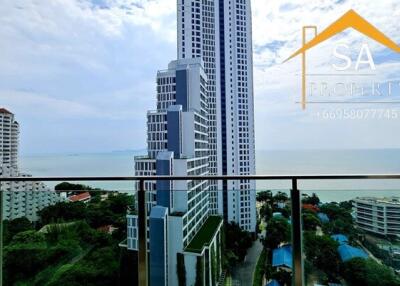 Scenic view from the balcony with high-rise buildings and ocean