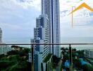 Scenic view from the balcony with high-rise buildings and ocean