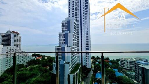 Scenic view from the balcony with high-rise buildings and ocean