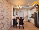 Dining area with a table and chairs near a kitchen