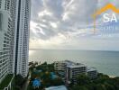 View of tall buildings and ocean from a high-rise apartment