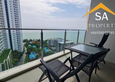 Balcony with ocean view and outdoor seating