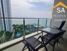 Balcony with ocean view and outdoor seating