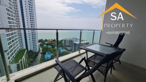 Balcony with ocean view and outdoor seating