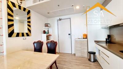 Modern kitchen area with dining table and decorative elements