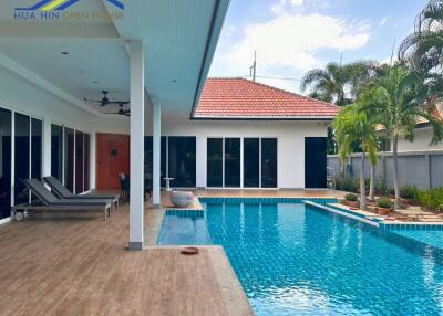 Outdoor area with swimming pool and seating