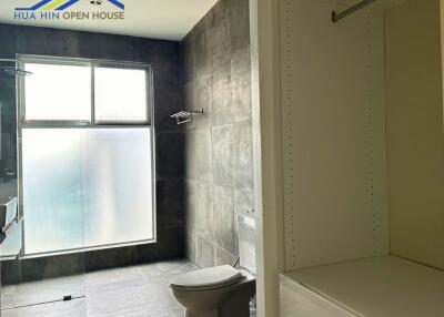 Modern bathroom with large frosted window