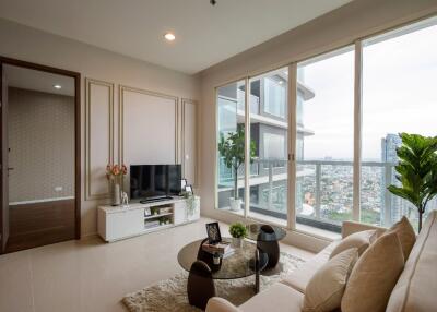 Modern living room with large windows and city view