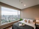 Bedroom with a city view