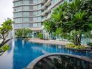 Modern building with outdoor pool and greenery