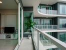 Modern living room with large balcony and outdoor view