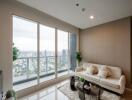 Modern living room with large windows and city view