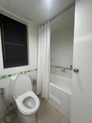 Bathroom with toilet and bathtub