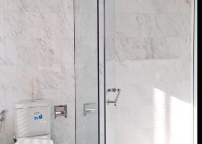 Modern bathroom with glass shower enclosure