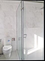 Modern bathroom with glass shower enclosure