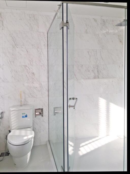 Modern bathroom with glass shower enclosure