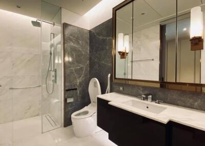 Modern bathroom with glass shower and vanity