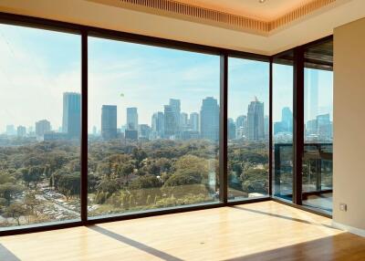 Living room with large windows and city view