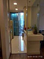 Modern kitchen with appliances and view of the balcony