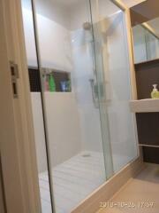 Modern bathroom with glass shower enclosure