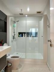 Modern bathroom with glass shower enclosure