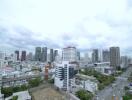 Skyline view of a city with multiple buildings and roads