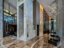 Modern building lobby with high ceilings and marble floors