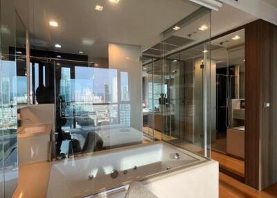 Modern bathroom with city view and built-in jacuzzi tub