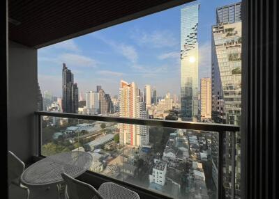 View from balcony overlooking city skyline