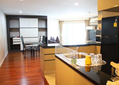 Modern kitchen with dining area and living space