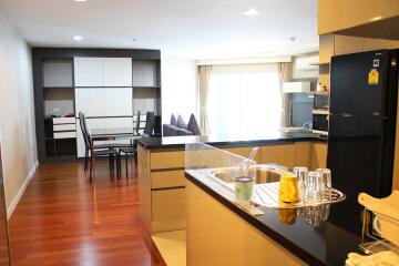 Modern kitchen with dining area and living space