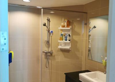 Modern bathroom with a glass-enclosed shower